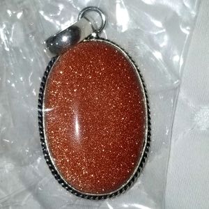Glittering sandstone pendant